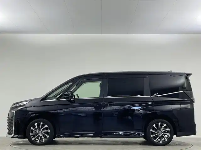 トヨタ ヴォクシー S－Z 埼玉県 2023(令5)年 2.5万km アティチュードブラックマイカ 純正１０．５型ナビ　１４．１型後席　両側　ＥＴＣ　ハーフレザー　シートヒーター　前後ドライブレコーダー　ＢＳＭ　ＲＣＴＡ　アダプティブヘッドライト　フルセグＴＶ　ＢＴ　ＬＥＤヘッドライト