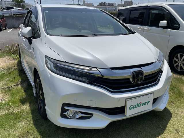 ホンダ シャトル ハイブリッド X ホンダセンシング 茨城県 2018(平30)年 7.5万km ホワイトオーキッドパール ・社外ナビ/・フルセグテレビ/・バックカメラ/・プッシュスタート/・ETC/・ドアバイザー/・メモリナビ/・クルーズコントロール