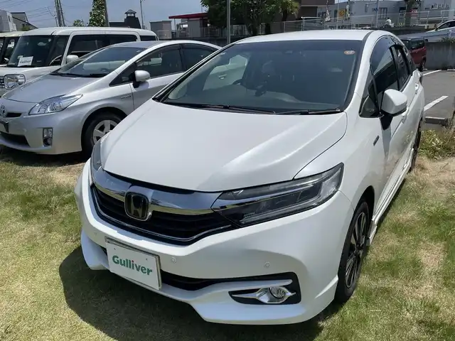 ホンダ シャトル ハイブリッド X ホンダセンシング 茨城県 2018(平30)年 7.5万km ホワイトオーキッドパール ・社外ナビ/・フルセグテレビ/・バックカメラ/・プッシュスタート/・ETC/・ドアバイザー/・メモリナビ/・クルーズコントロール