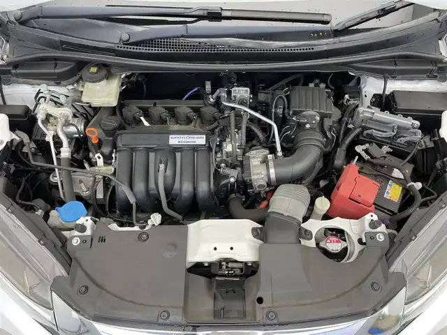 ホンダ シャトル ハイブリッド X ホンダセンシング 滋賀県 2018(平30)年 7.5万km ホワイトオーキッドパール 禁煙車/社外ナビ/CD.DVD.Bluetooth.フルセグ/バックカメラ/ホンダセンシング/●衝突軽減ブレーキ〈CMBS〉/●誤発進抑制機能/●歩行者事故低減ステアリング/●路外逸脱抑制機能/●ACC〈アダプティブ・クルーズ・コントロール〉/●LKAS〈車線維持支援システム〉/●先行車発進お知らせ機能/●標識認識機能/衝突軽減ブレーキ/レーダークルーズコントロール/レーンキープアシスト/前席シートヒーター/ビルトインETC/LEDヘッドライト/オートライト/クリアランスソナー/パドルシフト/スマートキー/スペアキー