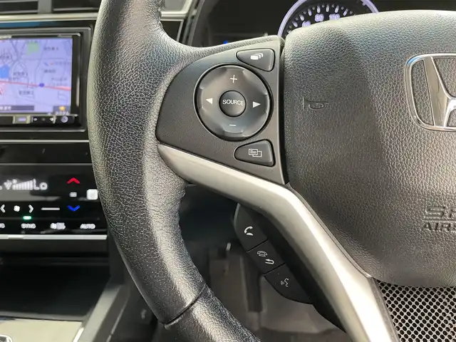 ホンダ シャトル ハイブリッド X ホンダセンシング 滋賀県 2018(平30)年 7.5万km ホワイトオーキッドパール 禁煙車/社外ナビ/CD.DVD.Bluetooth.フルセグ/バックカメラ/ホンダセンシング/●衝突軽減ブレーキ〈CMBS〉/●誤発進抑制機能/●歩行者事故低減ステアリング/●路外逸脱抑制機能/●ACC〈アダプティブ・クルーズ・コントロール〉/●LKAS〈車線維持支援システム〉/●先行車発進お知らせ機能/●標識認識機能/衝突軽減ブレーキ/レーダークルーズコントロール/レーンキープアシスト/前席シートヒーター/ビルトインETC/LEDヘッドライト/オートライト/クリアランスソナー/パドルシフト/スマートキー/スペアキー