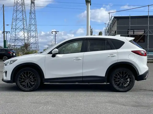 マツダ ＣＸ－５ XD 道央・札幌 2013(平25)年 12.1万km クリスタルホワイトパールマイカ ４WD/純正ディーラーOPナビ/CD/DVD/BT/フルセグ/トランクションコントロールシステム/クルーズコントロール/リアビークルモニタリングシステム/AFS/バックカメラ/サイドカメラ/ビルトインETC/アイドリングストップ/革巻きステアリング/ステアリングリモコン/自動防眩ミラー/MTモード付AT/プッシュスタート/スマートキー/HIDヘッドライト/オートライト/フォグランプ/電動格納ミラー/ウィンカーミラー/純正フロアマット/ドアバイザー/スペアキー