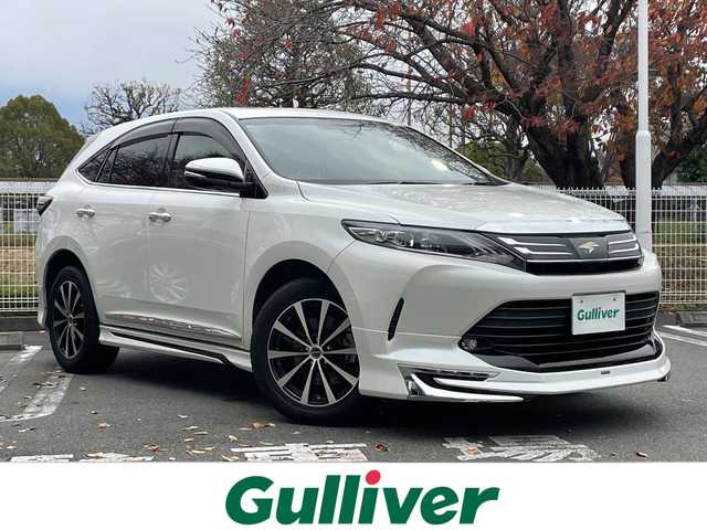 トヨタ ハリアー エレガンス 静岡県 2018(平30)年 6.4万km ホワイトパールクリスタルシャイン トヨタセーフティセンス　/サンルーフ　/モデリスタエアロ　/社外９型ナビ　/地デジ　/Ｂカメラ　/半革シート　/Ｄ席ＰＷシート　/オートハイビーム　/ETC/社外18インチAW/スペアキー