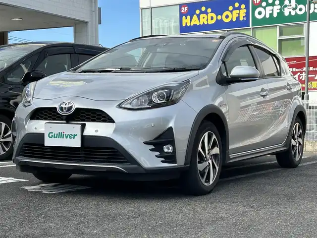 トヨタ アクア クロスオーバー 長崎県 2019(令1)年 8.1万km シルバーM 純正SDナビ/プッシュスタート/衝突軽減ブレーキ/前方ドライブレコーダー/全方位カメラ/ステアリングスイッチ/純正フロアマット/純正アルミホイール/ハーフレザーシート/LDA/ドアバイザー/オートライト/ETC/コーナーセンサー