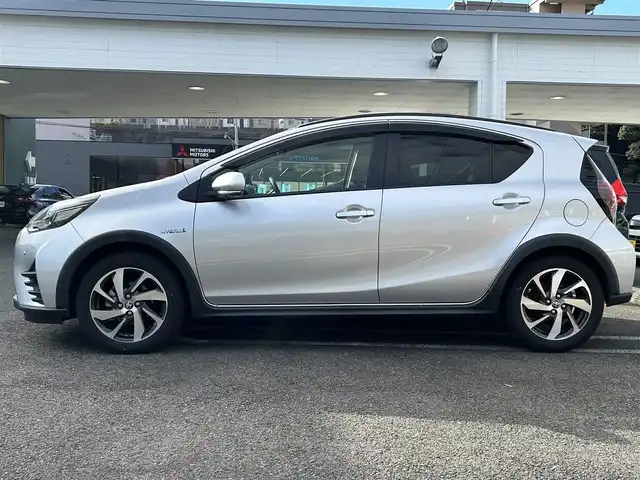 トヨタ アクア クロスオーバー 長崎県 2019(令1)年 8.1万km シルバーM 純正SDナビ/プッシュスタート/衝突軽減ブレーキ/前方ドライブレコーダー/全方位カメラ/ステアリングスイッチ/純正フロアマット/純正アルミホイール/ハーフレザーシート/LDA/ドアバイザー/オートライト/ETC/コーナーセンサー