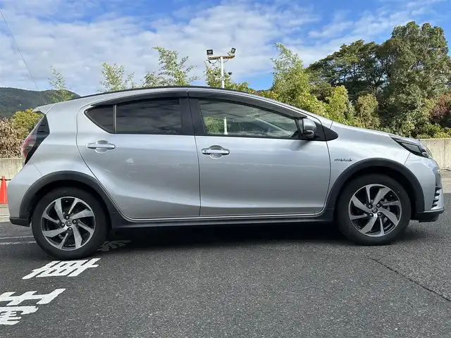 トヨタ アクア クロスオーバー 長崎県 2019(令1)年 8.1万km シルバーM 純正SDナビ/プッシュスタート/衝突軽減ブレーキ/前方ドライブレコーダー/全方位カメラ/ステアリングスイッチ/純正フロアマット/純正アルミホイール/ハーフレザーシート/LDA/ドアバイザー/オートライト/ETC/コーナーセンサー