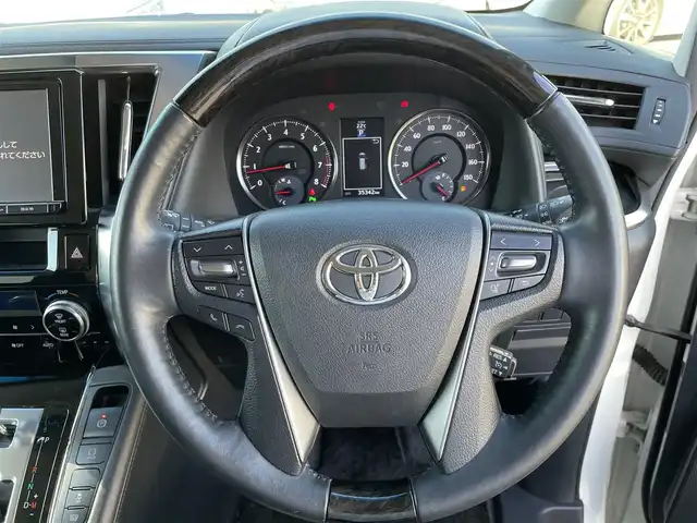 トヨタ ヴェルファイア Z Gエディション 愛媛県 2015(平27)年 3.6万km ホワイトパールクリスタルシャイン 純正９型ナビ　/モデリスタフルエアロ　/後席モニター　/Ｂカメラ　/クルコン　/障害物センサー　/純正前後ドラレコ　/ビルトインＥＴＣ　/Ｗエアコン　/両側電動スライドドア　/パワーシート　/ハーフレザー　/MTモード付き