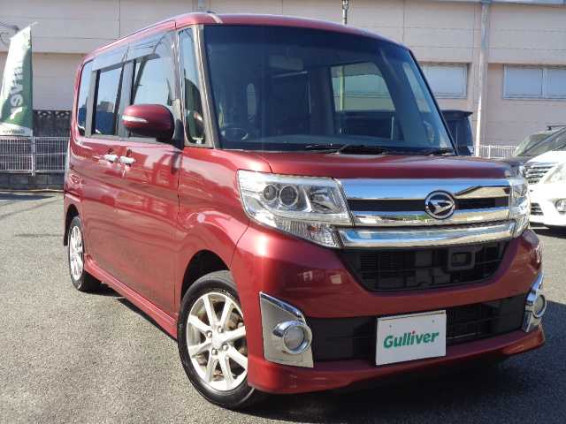 ダイハツ タント カスタム X トップED SA 鹿児島県 2015(平27)年 12.2万km ファイアークォーツレッドM ケンウッドフルセグＴＶナビゲーション（MDV-X702W)/ブルーツゥース．DVD. CD. SD録音再生．USBポート/バックカメラ/ステアリングリモコン/左リアドアパワースライドドア/右リアドアイージークロージャー/リアドア左右ロールシェイド/ハーフレザーシート/エコアイドル/リアシート左右独立スライドシート/運転席シートアジャスター（上下調整）/LEDオートライト/フロントLEDイルミネーション/プッシュスタート/スマートキーＸ1/取説．ナビ取説有り