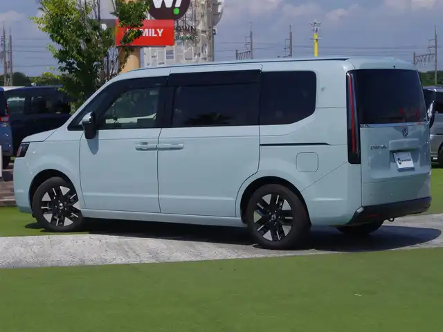 ホンダ ステップワゴン eHEV エアー 千葉県 2024(令6)年 0.3万km フィヨルドミストパール 登録時走行距離2533km/ワンオーナー/純正メモリナビ/（DVD/フルセグTV/Bluetooth/MSV）/バックカメラ/AppleCarPlay/フリップダウンモニター/ETC/両側パワースライドドア/HONDA SENSING/・アダプティブクルーズコントロール（ACC）/・衝突軽減ブレーキ（CMBS）/・車線維持支援システム（LKAS）/・誤発進抑制機能/・先行車発進お知らせ機能/・オートハイビーム/・標識認識機能/純正LEDヘッドライト/純正16インチアルミホイール/スマートキー/スペアキー1本/保証書/取扱説明書