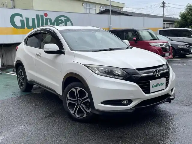 ホンダ ヴェゼル S 静岡県 2014(平26)年 12.6万km ホワイトオーキッドパール 社外8インチナビ/フルセグTV/DVD/CD/SD/MSV/BT/バックカメラ/ハーフレザーシート/前席シートヒーター/クルーズコントロール/ETC/LEDヘッドライト/ステアリングスイッチ/パドルシフト/スマートキー×2/保証書/取扱説明書