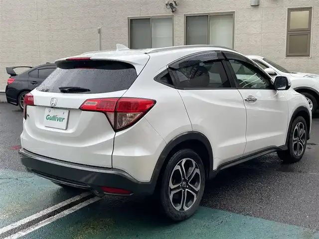 ホンダ ヴェゼル S 静岡県 2014(平26)年 12.6万km ホワイトオーキッドパール 社外8インチナビ/フルセグTV/DVD/CD/SD/MSV/BT/バックカメラ/ハーフレザーシート/前席シートヒーター/クルーズコントロール/ETC/LEDヘッドライト/ステアリングスイッチ/パドルシフト/スマートキー×2/保証書/取扱説明書