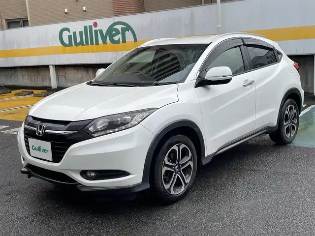 ホンダ ヴェゼル S 静岡県 2014(平26)年 12.6万km ホワイトオーキッドパール 社外8インチナビ/フルセグTV/DVD/CD/SD/MSV/BT/バックカメラ/ハーフレザーシート/前席シートヒーター/クルーズコントロール/ETC/LEDヘッドライト/ステアリングスイッチ/パドルシフト/スマートキー×2/保証書/取扱説明書