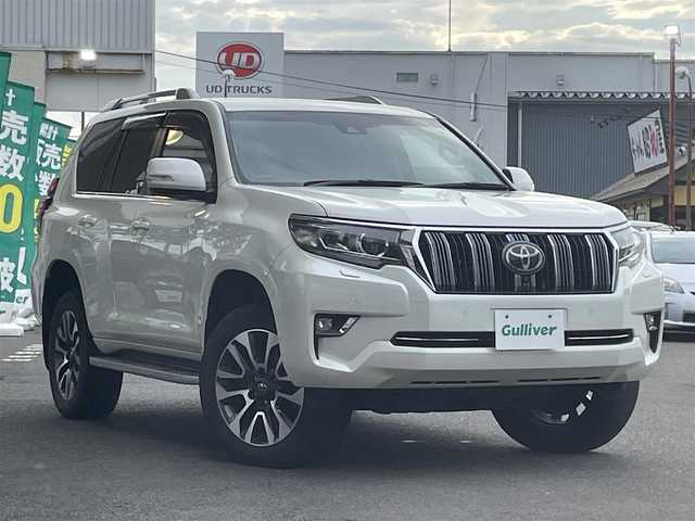 トヨタ ランドクルーザー プラド TX Lパッケージ 宮城県 2018(平30)年 9.1万km ホワイトパールクリスタルシャイン 7人乗り/純正メーカーOPナビ/フルセグTV/Bluetooth/パノラミックビューモニター/純正19インチAW/ETC2.0/D/Nシートヒーター/D/Nクーラーシート/D/Nパワーシート/アダプティブクルーズコントロール/レーンキープアシスト/コーナーセンサー/横すべり防止装置/オートライト/オートハイビーム/センターデフロック/ダウンヒルアシスト/3列目電動格納リアシート/純正マット