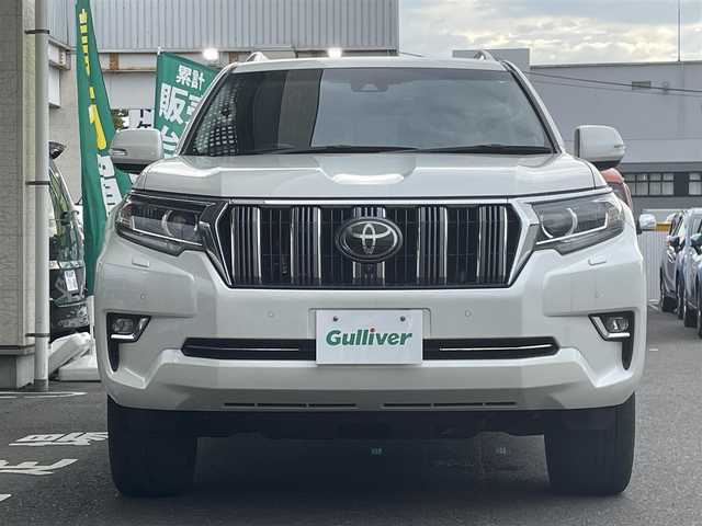 トヨタ ランドクルーザー プラド TX Lパッケージ 宮城県 2018(平30)年 9.1万km ホワイトパールクリスタルシャイン 7人乗り/純正メーカーOPナビ/フルセグTV/Bluetooth/パノラミックビューモニター/純正19インチAW/ETC2.0/D/Nシートヒーター/D/Nクーラーシート/D/Nパワーシート/アダプティブクルーズコントロール/レーンキープアシスト/コーナーセンサー/横すべり防止装置/オートライト/オートハイビーム/センターデフロック/ダウンヒルアシスト/3列目電動格納リアシート/純正マット