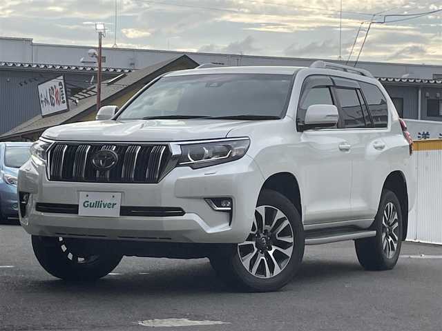 トヨタ ランドクルーザー プラド TX Lパッケージ 宮城県 2018(平30)年 9.1万km ホワイトパールクリスタルシャイン 7人乗り/純正メーカーOPナビ/フルセグTV/Bluetooth/パノラミックビューモニター/純正19インチAW/ETC2.0/D/Nシートヒーター/D/Nクーラーシート/D/Nパワーシート/アダプティブクルーズコントロール/レーンキープアシスト/コーナーセンサー/横すべり防止装置/オートライト/オートハイビーム/センターデフロック/ダウンヒルアシスト/3列目電動格納リアシート/純正マット