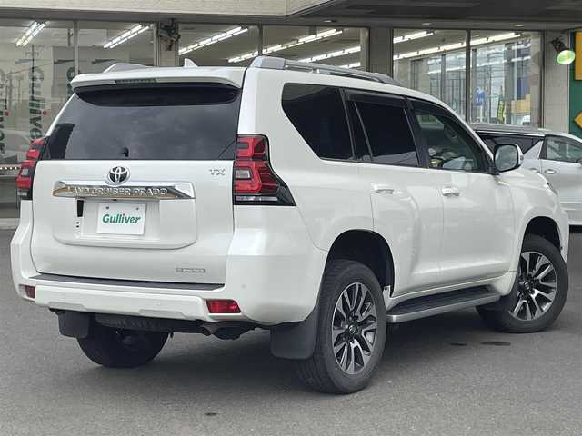 トヨタ ランドクルーザー プラド TX Lパッケージ 宮城県 2018(平30)年 9.1万km ホワイトパールクリスタルシャイン 7人乗り/純正メーカーOPナビ/フルセグTV/Bluetooth/パノラミックビューモニター/純正19インチAW/ETC2.0/D/Nシートヒーター/D/Nクーラーシート/D/Nパワーシート/アダプティブクルーズコントロール/レーンキープアシスト/コーナーセンサー/横すべり防止装置/オートライト/オートハイビーム/センターデフロック/ダウンヒルアシスト/3列目電動格納リアシート/純正マット
