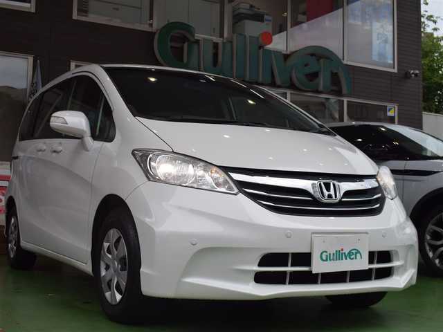 ホンダ フリード G ジャストセレクション 神奈川県 2013(平25)年 7.4万km ホワイトオーキッドパール ワンオーナー/フロントコーナーセンサー/片側パワースライドドア/ステアリングリモコン/スペアキー有/純正SDナビ/バックカメラ/Bluetooth/DVD/CD/6人乗り/２列目ウォークスルー/純正フロアマット/ETC/ECONモード/禁煙車/電動格納ミラー