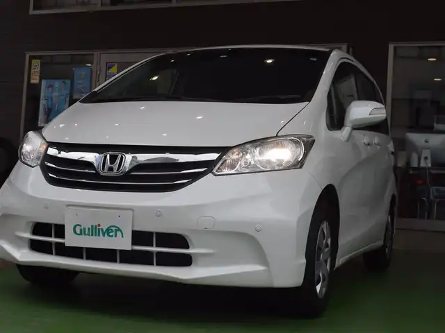 ホンダ フリード G ジャストセレクション 神奈川県 2013(平25)年 7.4万km ホワイトオーキッドパール ワンオーナー/フロントコーナーセンサー/片側パワースライドドア/ステアリングリモコン/スペアキー有/純正SDナビ/バックカメラ/Bluetooth/DVD/CD/6人乗り/２列目ウォークスルー/純正フロアマット/ETC/ECONモード/禁煙車/電動格納ミラー