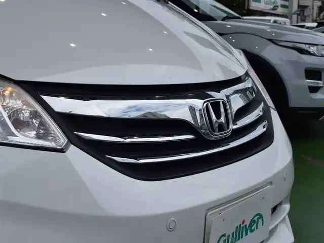 ホンダ フリード G ジャストセレクション 神奈川県 2013(平25)年 7.4万km ホワイトオーキッドパール ワンオーナー/フロントコーナーセンサー/片側パワースライドドア/ステアリングリモコン/スペアキー有/純正SDナビ/バックカメラ/Bluetooth/DVD/CD/6人乗り/２列目ウォークスルー/純正フロアマット/ETC/ECONモード/禁煙車/電動格納ミラー