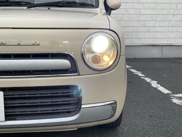 スズキ ラパン ショコラ G 愛知県 2013(平25)年 7.2万km ミルクティーベージュメタリック StradaSDナビ/Bluetooth　ワンセグTV/ドライブレコーダー/レザーシート/純正フロアマット/スマートキー/オートライト/電動格納ミラー/エンジンスタートボタン/アイドリングストップ