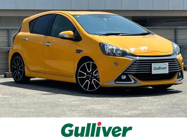 トヨタ アクア G G’s 静岡県 2016(平28)年 6.8万km イエロー トヨタセーフティセンスＣ/純正ＳＤナビ/バックカメラ/ＢＴオーディオ/フルセグＴＶ/ＥＴＣ/クルコン/専用ハーフレザーシート/オートハイビーム/ＬＥＤヘッドライト/ＬＤＡ/プリクラッシュ/Gzフロアマット/専用１７ＡＷ