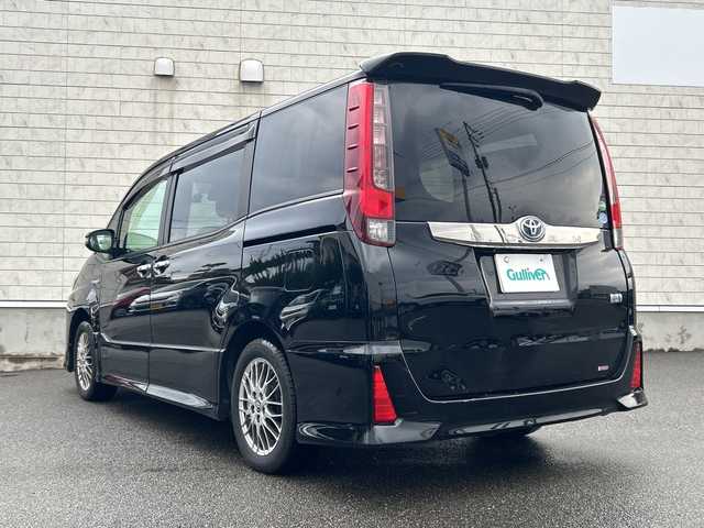 トヨタ ノア ハイブリッド Si ダブルバイビー 山形県 2016(平28)年 10.4万km ブラック 純正SDナビ/・フルセグTV/AM/FM/DVD/Bluetooth/衝突被害軽減ブレーキ/ドライブレコーダー/両側パワースライドドア/バックカメラ/レーンキープアシスト/クルーズコントロール/プリクラッシュセーフティ/オートライト/オートハイビーム/ETC/スマートキー/スペアキー/フォグランプ/冬タイヤ積載