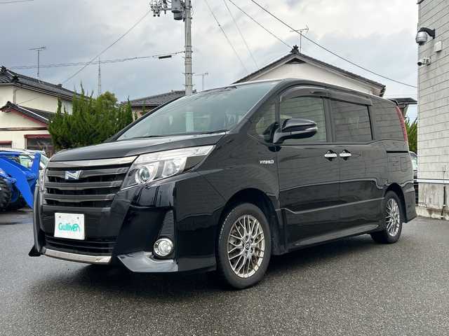 トヨタ ノア ハイブリッド Si ダブルバイビー 山形県 2016(平28)年 10.4万km ブラック 純正SDナビ/・フルセグTV/AM/FM/DVD/Bluetooth/衝突被害軽減ブレーキ/ドライブレコーダー/両側パワースライドドア/バックカメラ/レーンキープアシスト/クルーズコントロール/プリクラッシュセーフティ/オートライト/オートハイビーム/ETC/スマートキー/スペアキー/フォグランプ/冬タイヤ積載