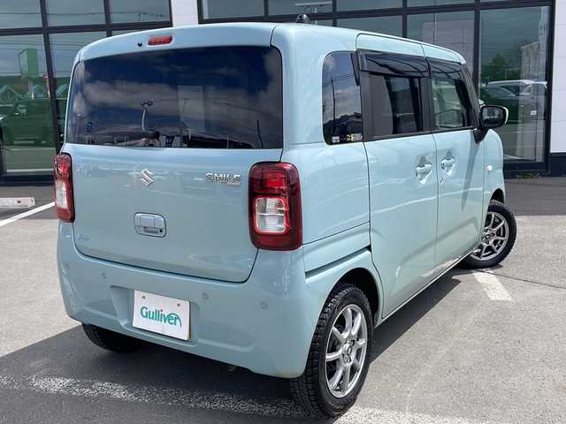 スズキ ワゴンＲ スマイル G 道東・釧路十勝 2021(令3)年 4.6万km オフブルーM ・４WD/・社外SDメモリナビ/（・AM・FM・SD・CD・BT・ワンセグ）/・スマートキー/・プッシュスタート/・運転席シートヒーター/・後方コーナーセンサー/・ETC/・衝突被害軽減システム/・横滑り防止装置/・レーンキープアシスト/・アンチブレーキングシステム/・オートライト/・ベンチシート/・フロアマット/・ダブルエアバック/・スペアキー1本/・保証書/・取扱説明書