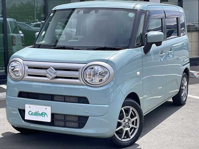 スズキ ワゴンＲ スマイル G 道東・釧路十勝 2021(令3)年 4.6万km オフブルーM ・４WD/・社外SDメモリナビ/（・AM・FM・SD・CD・BT・ワンセグ）/・スマートキー/・プッシュスタート/・運転席シートヒーター/・後方コーナーセンサー/・ETC/・衝突被害軽減システム/・横滑り防止装置/・レーンキープアシスト/・アンチブレーキングシステム/・オートライト/・ベンチシート/・フロアマット/・ダブルエアバック/・スペアキー1本/・保証書/・取扱説明書