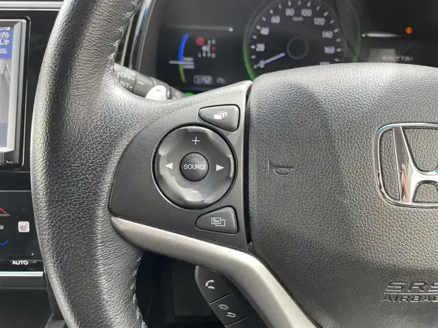 ホンダ シャトル ハイブリッド X ホンダセンシング 千葉県 2019(令1)年 6.8万km プラチナホワイトパール ホンダセンシング/・衝突軽減ブレーキ/・レーンキープアシスト/・標識認識機能/・オートマチックハイビーム/・アダプティブクルーズコントロール/純正8インチSDナビ【VXM-195VFEi】/・CD/DVD/Bluetooth/フルセグ/バックカメラ/ハーフレザーシート/前席シートヒーター/スマートキー/パドルシフト/純正LEDヘッドライト/LEDフォグランプ/ビルトインETC/社外ドライブレコーダー/純正15インチアルミホイール/本革巻きステアリング/ドアバイザー/サイド＆カーテンエアバッグ/新車時保証書＆取扱説明書