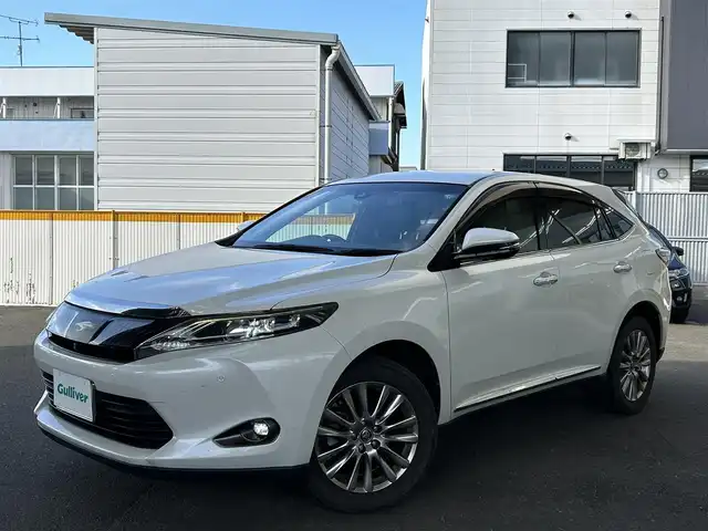 トヨタ ハリアー プレミアム アドバンスドP 宮城県 2014(平26)年 12.1万km ホワイトパールクリスタルシャイン ・ワンオーナー/・純正ナビ/（フルセグTV/CD/DVD/ブルーレイ/Bluetooth/AUX/USB）/・ドライブレコーダー/（CS-91FH)/・木目調パネル/・アイドリングストップ/・レーダークルーズコントロール/・前後コーナーセンサー/・ICS/・トラクションコントロール/・革ステアリング/・ステアリングスイッチ/・MTモード/・革シート/・前席シートヒーター/・D席メモリーシート/・電動リアゲート/・電動格納ミラー/・LEDライト/・フロントフォグランプ/・ISOFIX/・ETC/・バイザー/・リアプライバシーガラス/・フロアマット/・純正18インチアルミホイール/・フロアマット/・横滑り防止装置/・Wエアバッグ/ABS/・カーテンエアバッグ/・スマートキー/・プッシュスタート/・取扱説明書