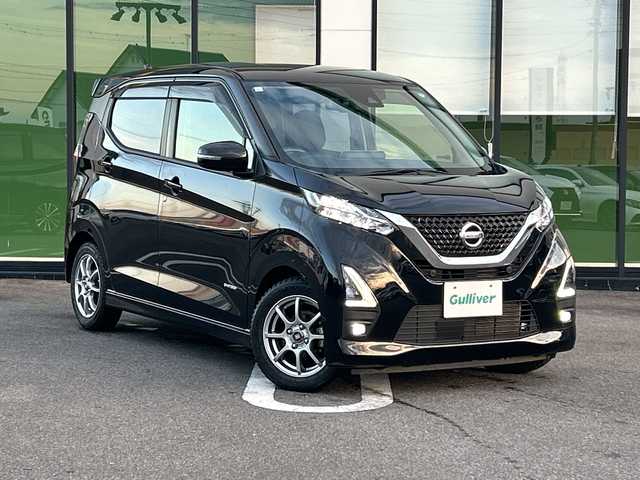日産 デイズ ハイウェイスターX 岐阜県 2021(令3)年 2.8万km ブラック 登録時走行距離27974km/純正9インチナビ（MM320D-L）/Bluetooth、ipod、USB、AUX、CD、DVD/バックモニター/フルセグテレビ/衝突被害軽減システム/純正アルミホイール有/純正フロアマット/ドライブレコーダー/LEDヘッドライト/フォグランプ/オートライト/スタッドレスタイヤ/ドアバイザー/横滑り防止装置/禁煙車/盗難防止装置/ベンチシート/スペアキー/スマートキー/プッシュスタート/アイドリングストップ/オートエアコン/取扱説明書/保証書/記録簿