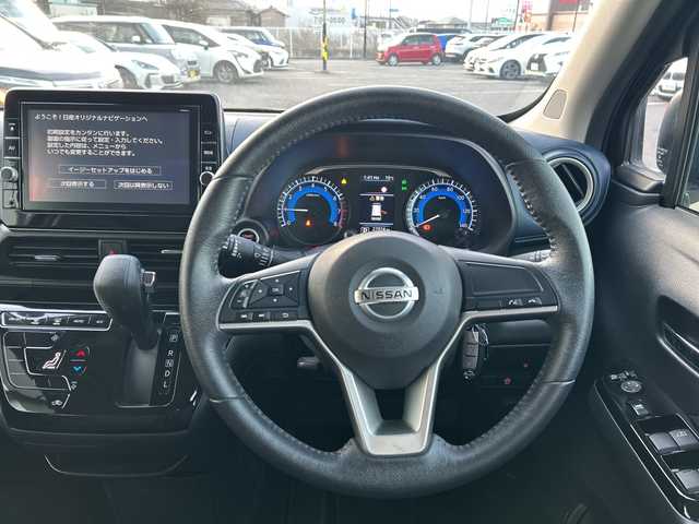 日産 デイズ ハイウェイスターX 岐阜県 2021(令3)年 2.8万km ブラック 登録時走行距離27974km/純正9インチナビ（MM320D-L）/Bluetooth、ipod、USB、AUX、CD、DVD/バックモニター/フルセグテレビ/衝突被害軽減システム/純正アルミホイール有/純正フロアマット/ドライブレコーダー/LEDヘッドライト/フォグランプ/オートライト/スタッドレスタイヤ/ドアバイザー/横滑り防止装置/禁煙車/盗難防止装置/ベンチシート/スペアキー/スマートキー/プッシュスタート/アイドリングストップ/オートエアコン/取扱説明書/保証書/記録簿