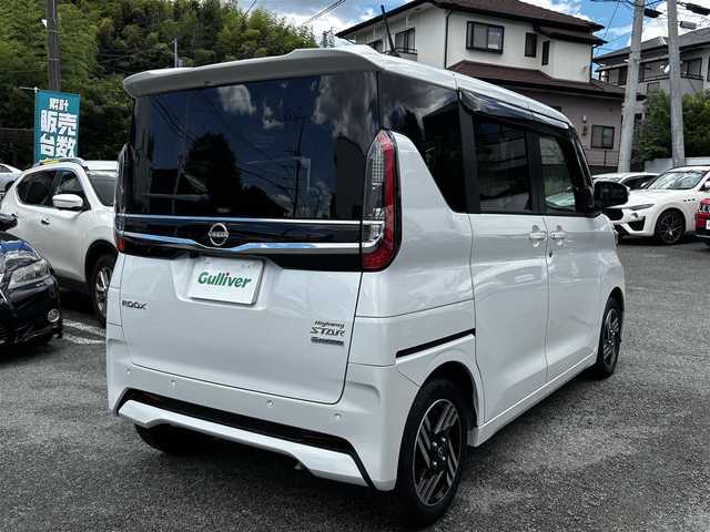 日産 ルークス HWS X プロパイロットED 熊本県 2024(令6)年 0.3万km ホワイトパール ワンオーナー/純正9インチナビ（MM223D-L）/【フルセグTV/Bluetooth/AM/FM】/全周囲カメラ/両側パワースライドドア/プロパイロット/エマージェンシーブレーキ/レーダークルーズコントロール/コーナーセンサー/標識表示/先行車発進警告/レーンアシスト/オートホールド/純正14インチAW/オートLEDライト/フォグランプ/シートバックテーブル/ナビ連動ドライブレコーダー/プッシュスタート/スマートキー/アイドリングストップ/純正フロアマット/純正ドアバイザー/盗難防止装置/保証書/取扱説明書