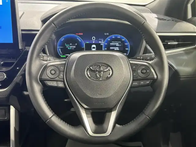 トヨタ カローラ クロス ハイブリッド Z 愛知県 2024(令6)年 0.6万km プラチナホワイトパールマイカ 純正９インチナビ　/(FM/AM/Bluetooth/フルセグTV/AppleCarPlay/AndoroidAuto)/パノラマルーフ　/ブラインドスポットモニター　/トヨタセーフティセンス　/　　-プリクラッシュセーフティ/　　-レーントレーニングアシスト＋レーンディパーチャーアラート/　　-レーダークルーズコントロール/　　-オートマチックハイビーム/　　-ロードサインアシスト/　　-発進遅れ告知機能/ビルトインＥＴＣ２．０　/シートヒーター　/ＬＥＤヘッドライト　/バックカメラ　/電動リアゲード/D席パワーシート　/純正フロアマット　/半革シート　/フォグランプ/プッシュスタート/　　-スマートキー