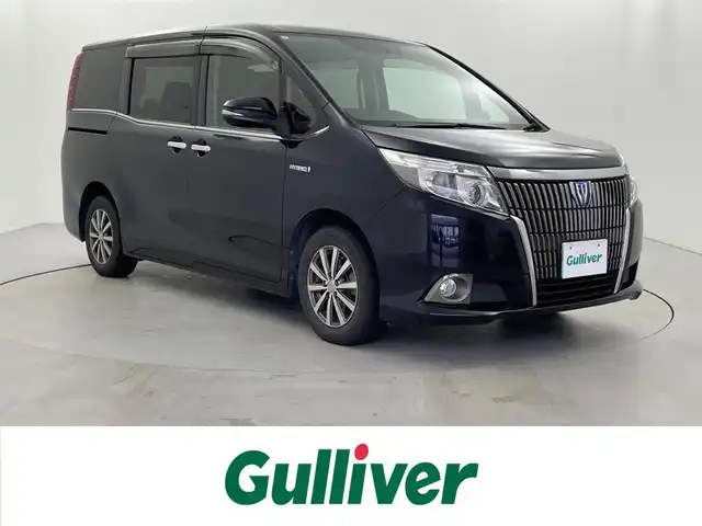 トヨタ エスクァイア ハイブリッド Gi 福井県 2015(平27)年 13.2万km スパークリングブラックパールクリスタルシャイン アルパイン製ＢＩＧＸナビ　/アルパイン製フリップダウンモニター　/バックカメラ　/シートヒーター　/レザーシート　/両側パワースライドドア　/置くだけ充電　/クルーズコントロール　/純正ビルトインＥＴＣ　/衝突被害軽減ブレーキ