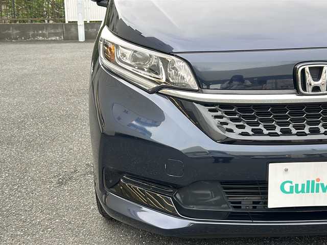 ホンダ フリード ハイブリット G ホンダセンシング 埼玉県 2020(令2)年 4.3万km ミッドナイトブルービームM 登録時４２３４５ｋｍ/ワンオーナー/純正SDナビ(フルセグ)/BT/CD/DVD/両側パワースライドドア/衝突被害軽減装置/横滑り防止装置/レーダークルーズコントロール/レーンキープアシスト/バックセンサー/ナビ連動型純正前後ドライブレコーダー/ナビ連動型ETC/バックカメラ/純正１５インチアルミホイール/ステアリングリモコン/シートヒーター（D＋N）/プラズマクラスター搭載エアコン/LEDヘッドライト/フォグランプ/ヒーテッドミラー/プッシュスタート/スマートキー/保証書/取扱説明書/ナビ取扱説明書