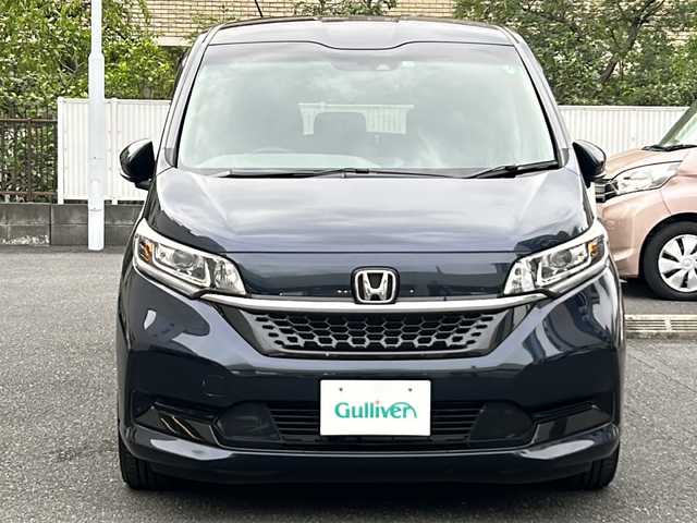 ホンダ フリード ハイブリット G ホンダセンシング 埼玉県 2020(令2)年 4.3万km ミッドナイトブルービームM 登録時４２３４５ｋｍ/ワンオーナー/純正SDナビ(フルセグ)/BT/CD/DVD/両側パワースライドドア/衝突被害軽減装置/横滑り防止装置/レーダークルーズコントロール/レーンキープアシスト/バックセンサー/ナビ連動型純正前後ドライブレコーダー/ナビ連動型ETC/バックカメラ/純正１５インチアルミホイール/ステアリングリモコン/シートヒーター（D＋N）/プラズマクラスター搭載エアコン/LEDヘッドライト/フォグランプ/ヒーテッドミラー/プッシュスタート/スマートキー/保証書/取扱説明書/ナビ取扱説明書