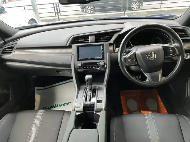 ホンダ シビック ハッチバック 神奈川県 2017(平29)年 3.9万km ブリリアントスポーティブルーメタリック2トーン 新車保証書/取扱説明書/純正オプションナビ・フルセグTV/CD・DVDビデオ・Bluetooth/バックカメラ/ビルトインETC/アイドリングストップ/スマートキー/ステアリングスイッチ/クルーズコントロール/前席シートヒーター/電子サイドブレーキ/BRAKEHOLD/LEDヘッドライト/18インチアルミホイール