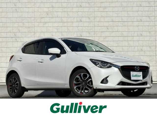 マツダ デミオ XD 岩手県 2014(平26)年 7.6万km スノーフレイクホワイトパールマイカ 禁煙車/ディーゼル/サイドスポイラー/ヘッドアップデュスプレイ/クルーズコントロール/横滑り防止装置/純正ナビ/→フルセグ/Bluetooth/CD/DVD/FM/AM/USB/AUX/ステアリングスイッチ/オートライト/LEDヘッドライト/LEDフォグライト/〇プッシュスタート/〇パドルシフト/〇電動格納ミラー/〇ウィンカーミラー/〇シガーソケット/〇ドアバイザー/〇フロアマット/〇スマートキー/前後ドライブレコーダー/ETC