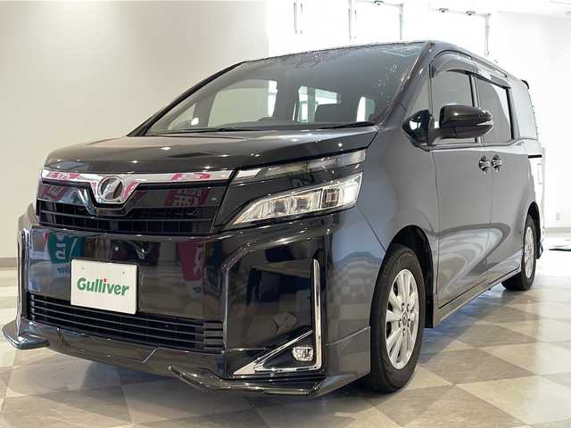 トヨタ ヴォクシー V 福井県 2017(平29)年 18万km イナズマスパーキングブラックガラスフレーク 純正ナビ/フルセグTV/バックカメラ/ビルトインETC/前後ドライブレコーダー/クルーズコントロール/両側パワースライドドア/シートヒーター/MTモード付AT/オートライト/オートハイビーム/LEDヘッドライト/フォグランプ/レーンキープアシスト/衝突被害軽減システム/純正AW/プッシュスタート/スマートキー/スペアキー/ステアリングスイッチ