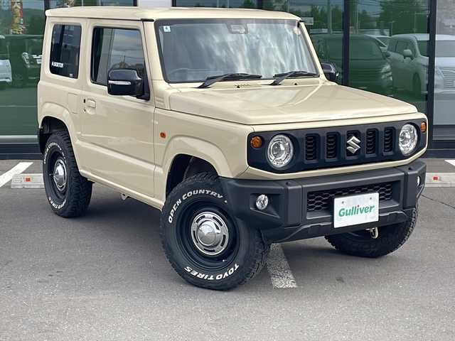 スズキ ジムニー XC 道東・釧路十勝 2020(令2)年 4.6万km シフォンアイボリーM ・４WD/・社外ディスプレイオーディオ/（CD/DVD/BT/FM/AM/iPod）/・バックカメラ/・衝突軽減ブレーキ/・車線逸脱防止/・横滑り防止/・ダウンヒルアシストコントロール/・クルーズコントロール/・前席シートヒーター/・本革巻きステアリング/・ステアリングスイッチ/・プッシュスタート/・オートライト/・LEDヘッドライト/・純正フロアマット/・社外16インチアルミホイール/・社外アルミ付きスタッドレス積込（ホワイトレタータイヤ）/・取扱説明書/・保証書