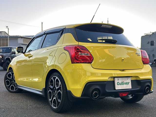 スズキ スイフト スポーツ セーフティPKG 愛知県 2019(平31)年 4.4万km チャンピオンイエロー 禁煙車/Carrozzeria社外ナビ/　AM/FM/HDMI/DISC/BT/USB/フルセグTV/HKSマフラー/純正フルエアロ/前後ドライブレコーダー/バック・全方位カメラ/レーンキープアシスト/追従機能付きクルーズコントロール/衝突被害軽減システム/横滑り防止装置/USB入力端子/ETC/オートライト/HIDヘッドライト/フォグランプ/純正フロアマット/純正17インチAW/純正ドアバイザー/W＋サイドエアバッグ/保証書/取説