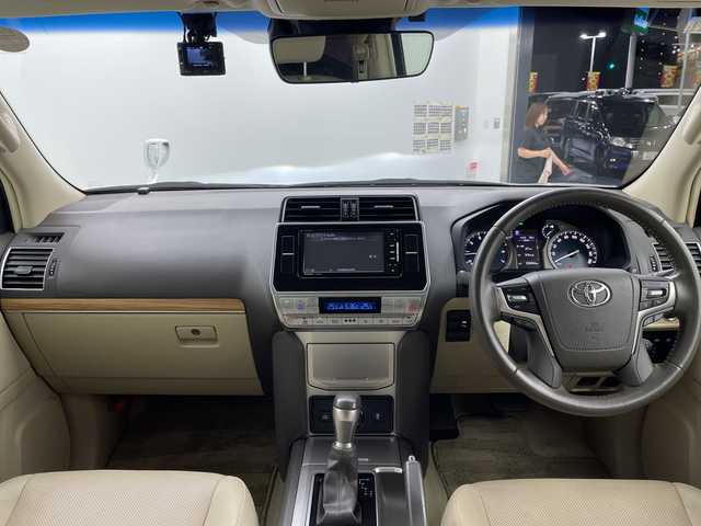 トヨタ ランドクルーザー プラド TX Lパッケージ 愛知県 2018(平30)年 3.5万km ホワイトパールクリスタルシャイン モデリスタエアロ/ベージュ本革シート/シートヒーター・エアシート/ストラーダSDナビ・フルセグTV/CD・DVD・Bluetooth/バックカメラ/純正オプション19インチAW/純正LEDヘッドライト/純正ビルトインETC/レーダークルーズコントロール/クリアランスソナー/プリクラッシュセーフティ/前席パワーシート/禁煙車
