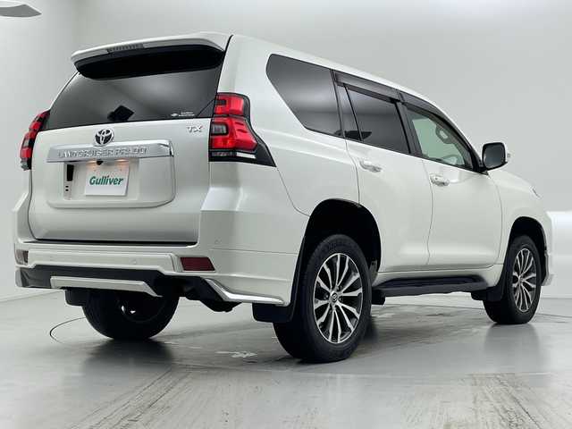 トヨタ ランドクルーザー プラド TX Lパッケージ 愛知県 2018(平30)年 3.5万km ホワイトパールクリスタルシャイン モデリスタエアロ/ベージュ本革シート/シートヒーター・エアシート/ストラーダSDナビ・フルセグTV/CD・DVD・Bluetooth/バックカメラ/純正オプション19インチAW/純正LEDヘッドライト/純正ビルトインETC/レーダークルーズコントロール/クリアランスソナー/プリクラッシュセーフティ/前席パワーシート/禁煙車