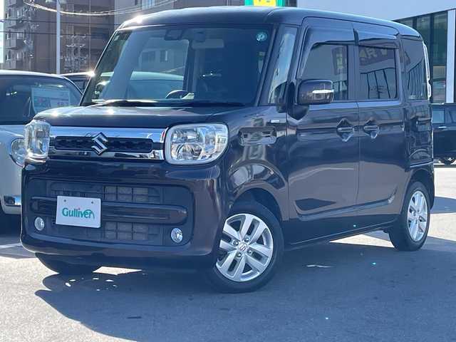 スズキ スペーシア HYBRID X 長野県 2019(令1)年 4.1万km アーバンブラウンパールメタリック 禁煙車/4WD/両側電動スライドドア/KENWOODメモリナビ【MDV-D7068TW】/(Bluetooth/フルセグTV/iPod/CD/DVD/FM/AM)/バックカメラ/前方ドライブレコーダー/前席シートヒーター/衝突被害軽減システム/クリアランスソナー/レーンキープアシスト/後方コーナーセンサー/純正アルミホイール/純正フロアマット/パワーモード/オートマチックハイビーム/オートライト/LEDヘッドライト/フォグランプ/ドアバイザー/アイドリングストップ/スマートキー/プッシュスタート/サイドエアバッグ/盗難防止装置/ABS/横滑り防止装置/パワーステアリング/パワーウインドウ/取扱説明書