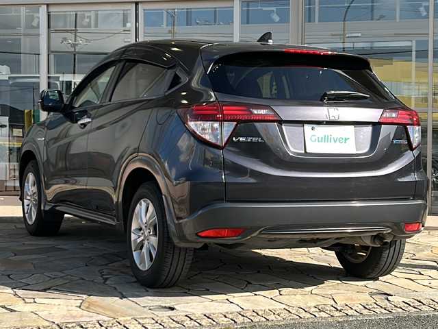 ホンダ ヴェゼル ハイブリッド X 静岡県 2014(平26)年 9.5万km ルーセブラックM 純正メモリナビ/・CD/・DVD/・フルセグＴＶ/・Bluetooth/・USB/・AM/・FM/主要装備/・衝突軽減/・レーンキープ/・クルコン/・バックカメラ/・ETC/・ドラレコ前後/・パドルシフト/・ステリモ/・LEDヘッドライト/・オートライト/・オートハイビーム/・フォグランプ/・純正フロアマット/・純正アルミホイール/・電動パーキングブレーキ/・オートホールド