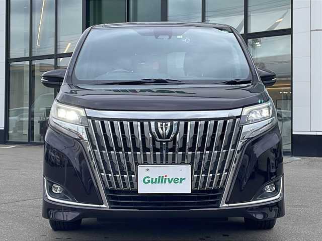 トヨタ エスクァイア Gi 青森県 2019(令1)年 3.8万km ボルドーマイカメタリック ・４WD/・純正フルセグナビTV/・AM/FM/Bluetooth/CD/・D＋N席シートヒーター/・両側パワースライドドア/・寒冷地仕様/・クルーズコントロール/・USBソケット/・HDMIソケット/・レーンキープアシスト/・衝突軽減装置/・アイドリングストップ/・フリップダウンモニター/・純正ドアバイザー/・ステアリングリモコン/・ビルトインETC2.0/・純正フロアマット/・レザーシート/・8人乗り/・前後ドライブレコーダー/・保証書/・取扱説明書