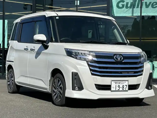 トヨタ ルーミー カスタムG 鹿児島県 2023(令5)年 2.9万km パールホワイトⅢ ワンオーナー/社外ディスプレイオーディオ/　　BT/フルセグ/アラウンドビューモニター/両側パワスラ/レーダークルーズコントロール/LEDヘッドライト/純正14インチアルミホイール/アイドリングストップ/スマートキー/ビルトインETC