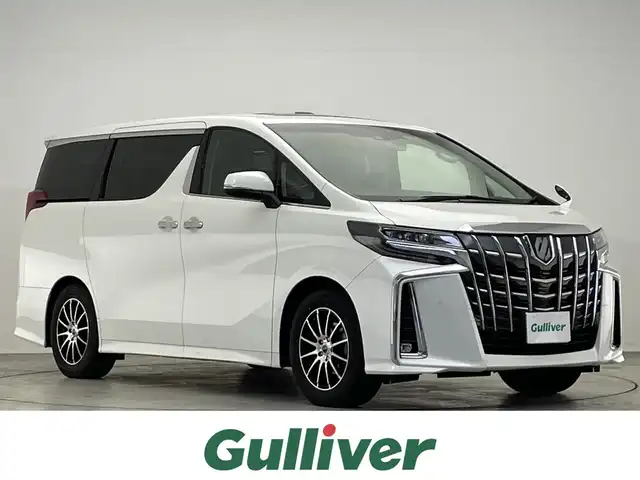 トヨタ アルファード S Cパッケージ 滋賀県 2021(令3)年 4.4万km ホワイトパールクリスタルシャイン 禁煙車/ツインムーンルーフ/純正9型ナビ/（CD/DVD/Bluetooth/USB/Apple Car Play/Android Auto/Miracast/フルセグTV)/バックカメラ/両側パワースライドドア/純正12.1型フリップダウンモニター/ビルトインETC/前後ドラレコ/パワーバックドア/1列目シートヒーター/シートベンチレーション/1列目2列目パワーシート/ステアリングヒーター/オットマンチェア/LEDヘッドライト/オートライト/トヨタセーフティセンス/　・オートハイビーム/　・レーントレーシングアシスト/　・プリクラッシュセーフティ/　・レーダークルーズコントロール/クリアランスソナー/ロードサインアシスト/先行車発進告知機能/MTモード付AT/電動パーキングブレーキ/オートブレーキホールド/プッシュスタート/スマートキー/スペアキー